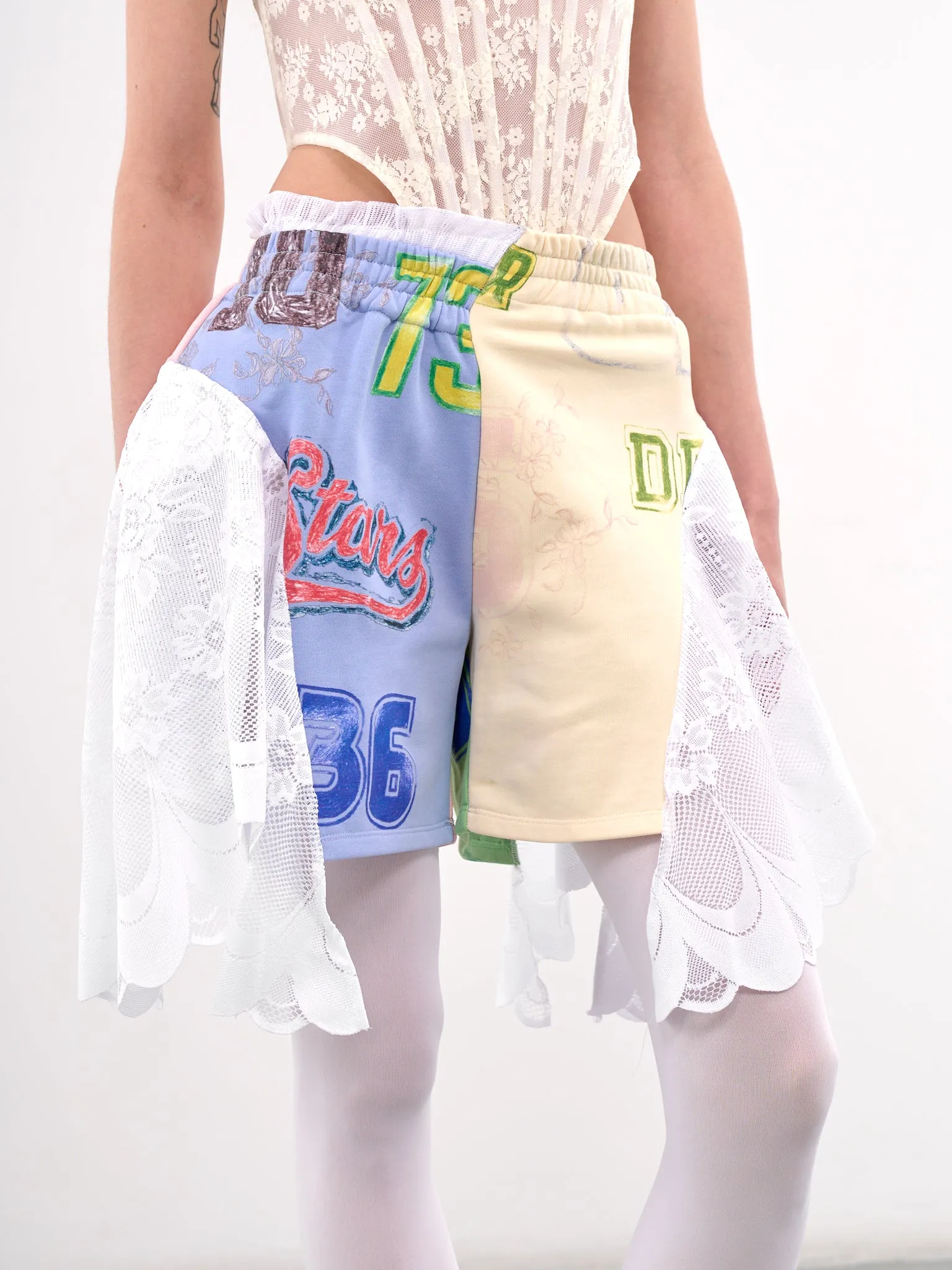 Asymmetric Patchwork Ruffled Shorts (00TR04-MULTI)