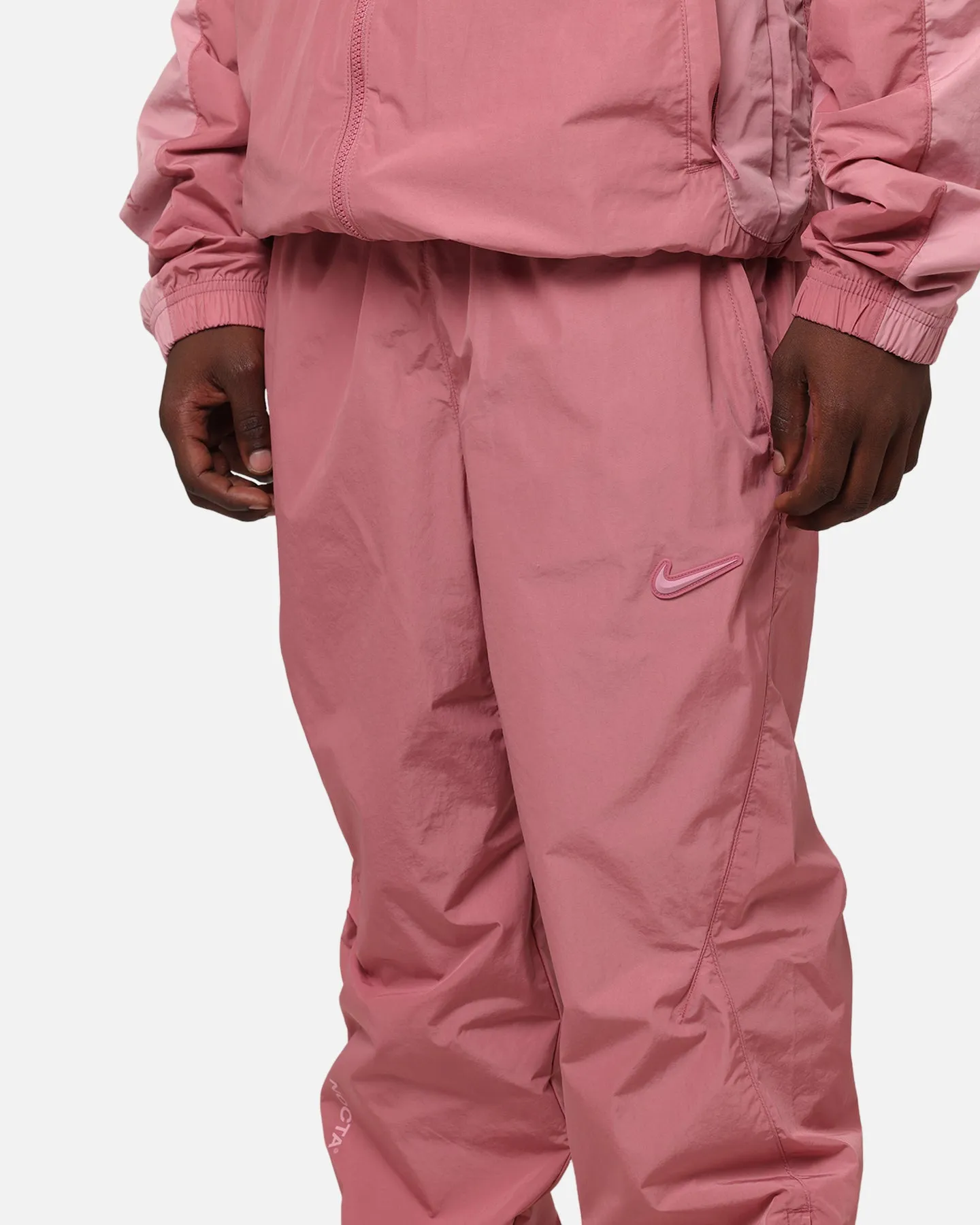 Nike Nocta Northstar Nylon Track Pants Desert Berry