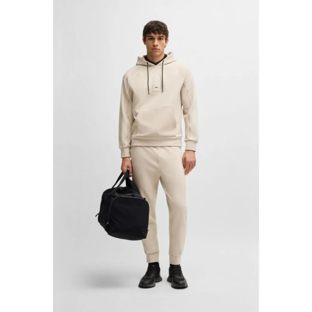 Stretch tracksuit bottoms with logo patch