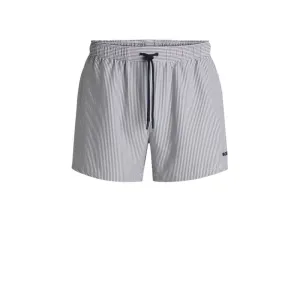 Swim shorts in striped seersucker fabric