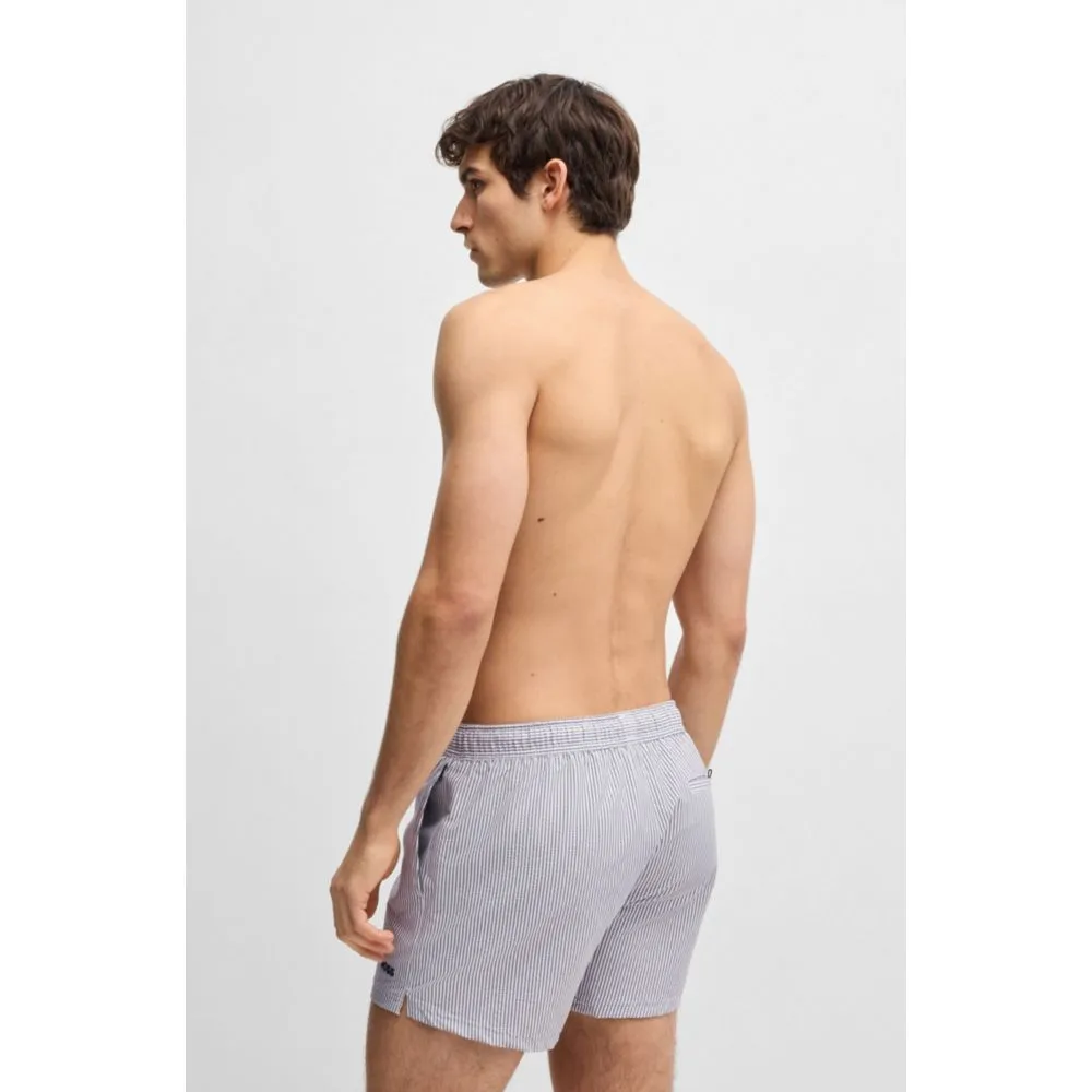 Swim shorts in striped seersucker fabric