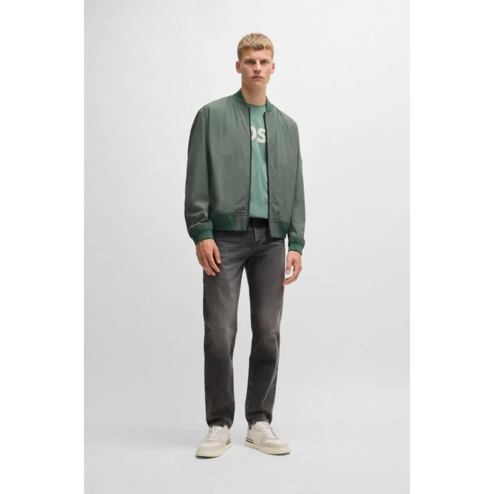 Water-repellent jacket with zipped sleeve pocket